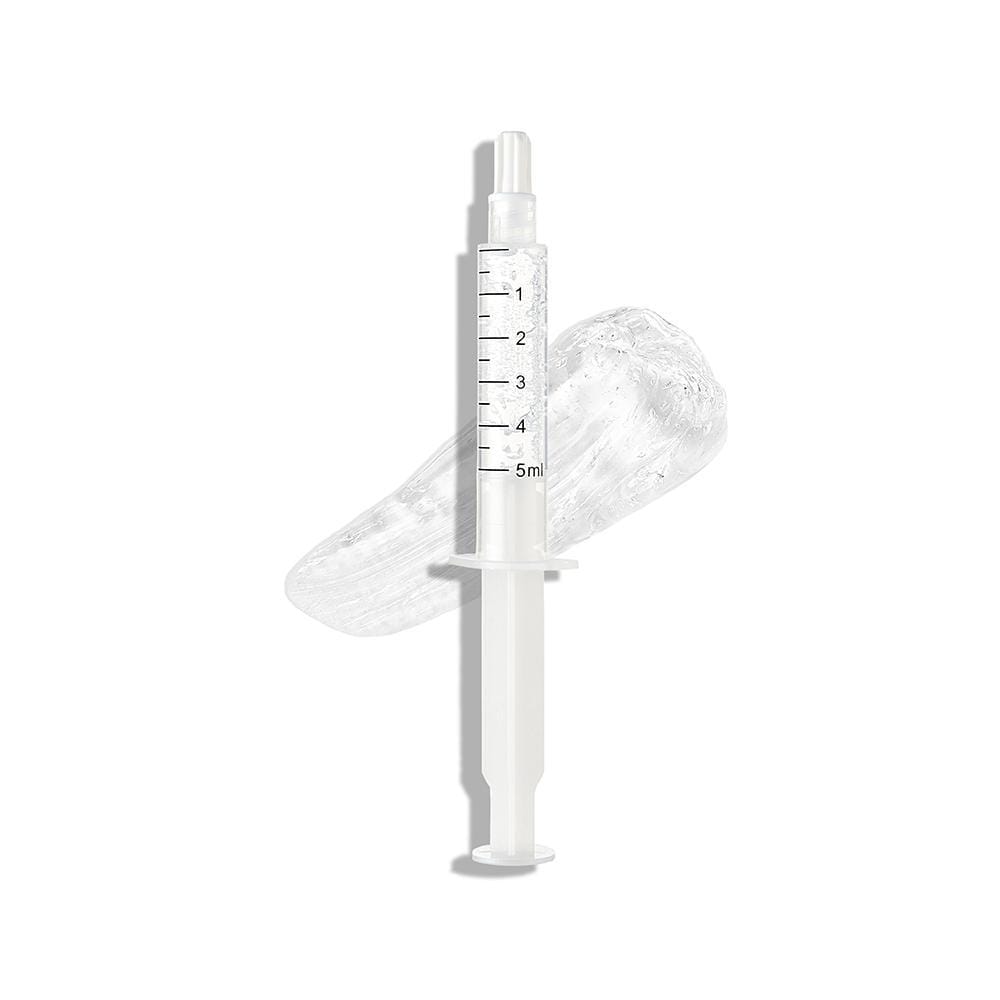Close up image of a syringe that contains the formula of Active Wow Premium Teeth Whitening Kit